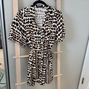 Elegant Black and Cream Patterned Dress